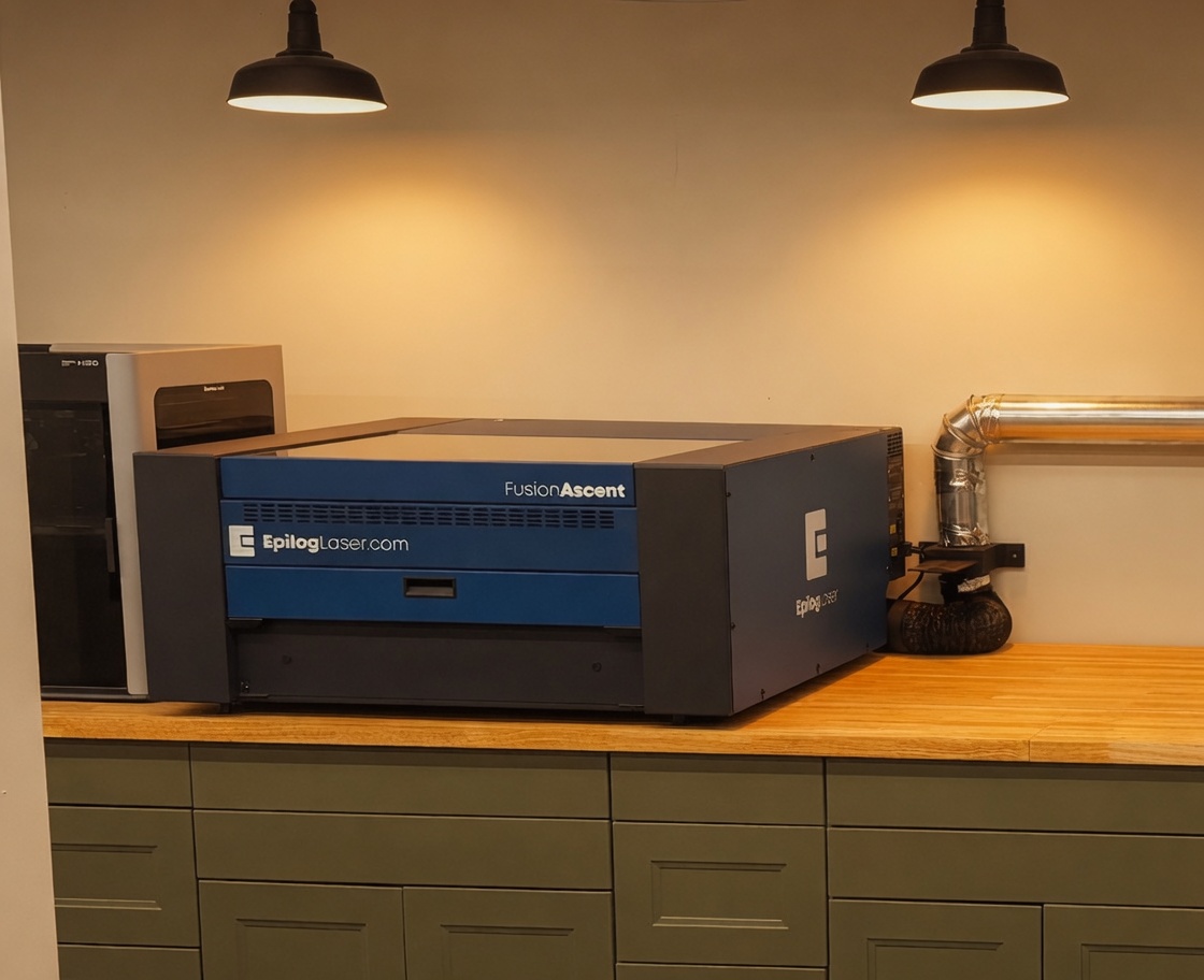 Epilog Fusion Ascent laser engraver on the shop workbench